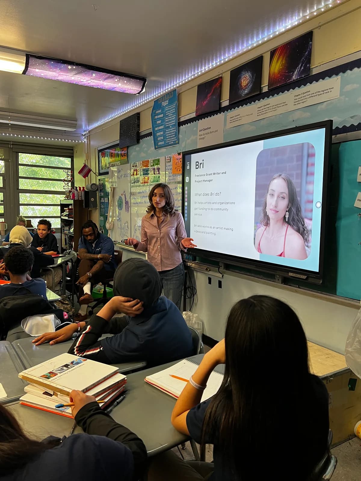 Career Day speaker presenting to students in a classroom.